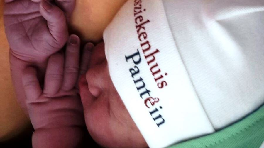 Baby met mutsje Baby met mutsje